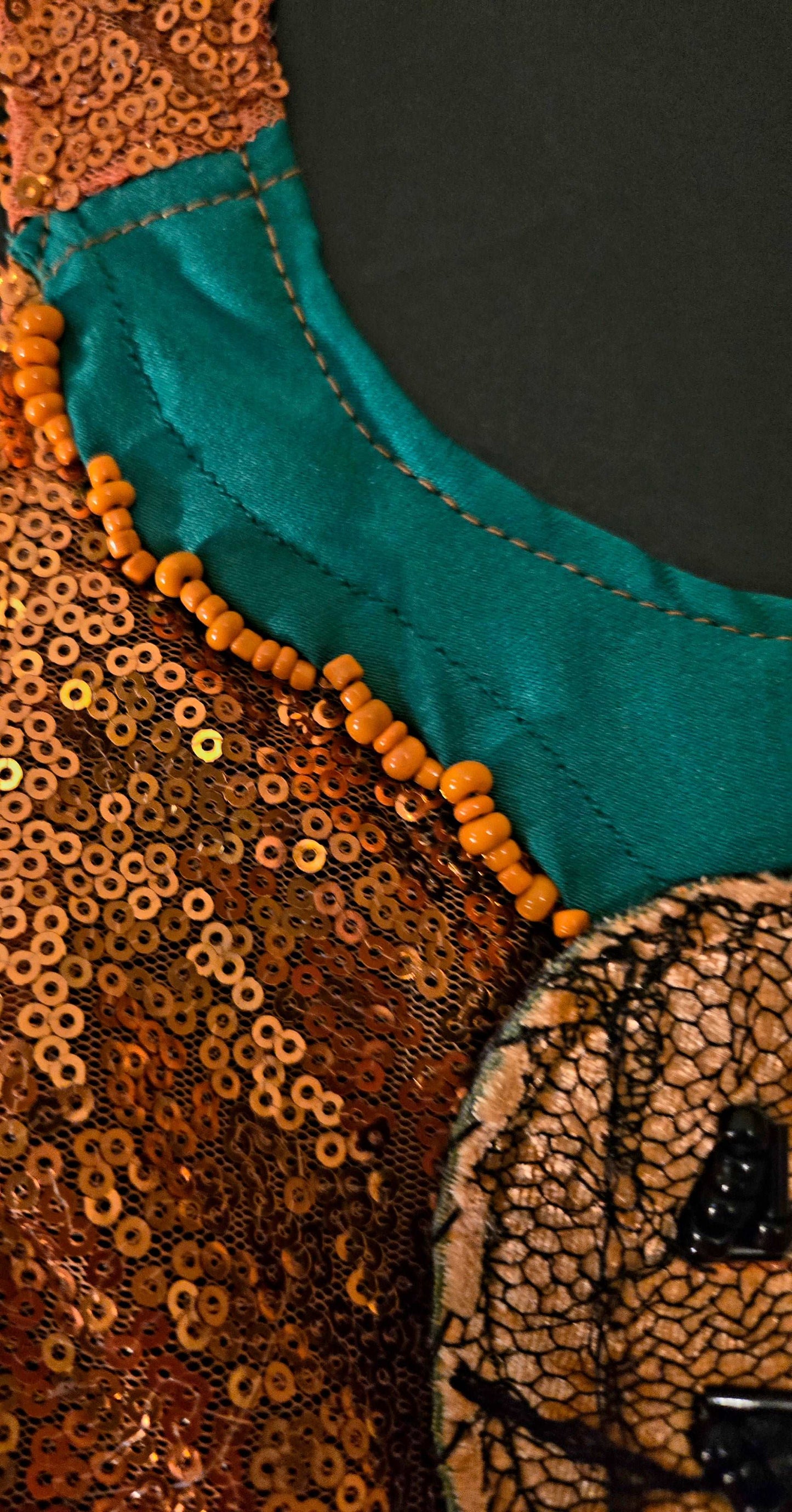 Jack-O-Lantern Extravaganza
All items are Limited Quantity.
Pumpkin colored sequin mesh fabric. Matching tulle fabric skirt.
Matching Pumpkin colored sequin fabric skirt with a pumpkin silhouette. Matching sequin fabric, black tulle, hair bow with glass bead embellishment and black satin ribbon. Glass bead embellishment resembles a maggot but still very playful and cute. Hair bow measures 3 inches wide and 2 inches tall.
Green collar with glass bead embellishment that resembles maggots (cute).Included is a 