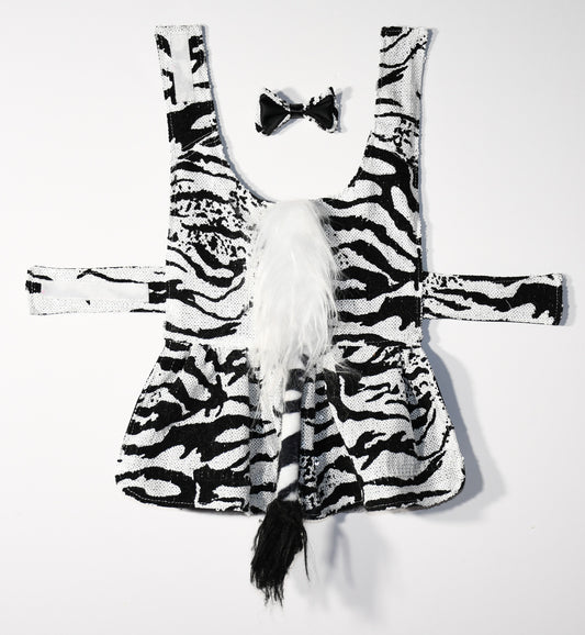 Zebra Sequin fabric.
Fully lined with Black satin fabric.
Velcro added to neck and abdomen for comfort.
Black Tulle under skirt.
White faux fur Zebra back details.
Black faux fur tail.
Matching fabric hair bow.
Head Designer Mister Fashion signs or initials all items on backside or somewhere in the lining.