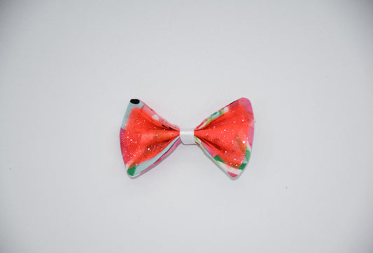 Made of a Watercolor Watermelon print fabric.
Glitter tulle fabric
White satin ribbon.
Hair bow measures 3 inches wide and 2 inches tall.
Head Designer Mister Fashion signs or initials all items on backside or somewhere in the lining.